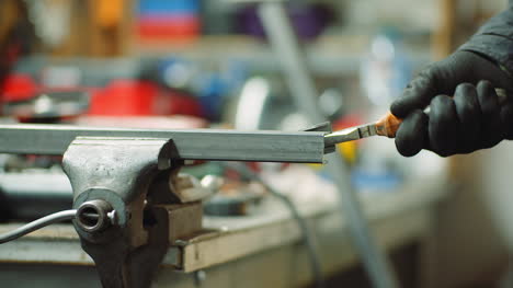 Man-Working-At-Metal-Industry-Cutting-And-Measuring-Metal-Parts-At-Workshop-8