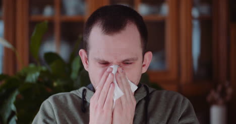 Young-Weak-Man-Sneezing-Having-Temperature-Cough-4