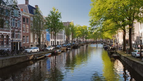 Scenic-Canal--in-Amsterdam-with-Boats