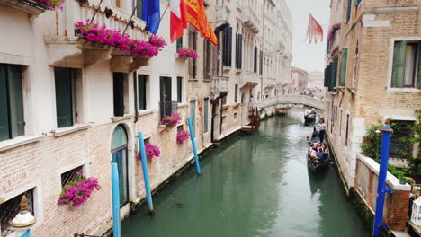 Gondolas-on-Narrow-Canal-In-Venice
