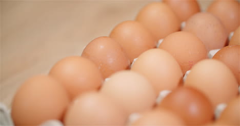 Eggs-Extruder-Full-Of-Fresh-Eggs-On-Black-Background-5