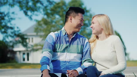 Asian-Man-And-Caucasian-Woman-by-House