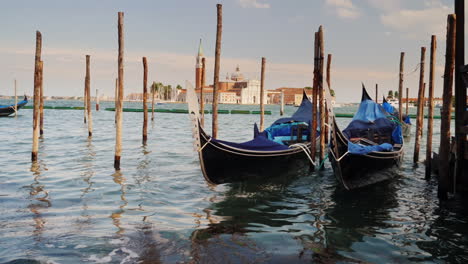Venetian-Gondolas-Tied-To-Posts
