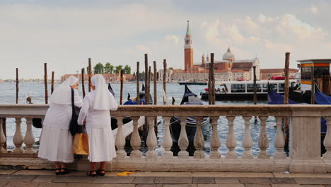 Nuns-In-White-Robes-Admire-Venice