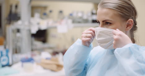 Scientist-Wearing-Protective-Mask-At-Laboratory-2