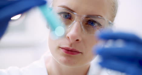 Portrait-Of-Female-Scientist-With-A-Pipette-Analyzes-A-Liquid-To-Extract-The-Dna-In-Lab