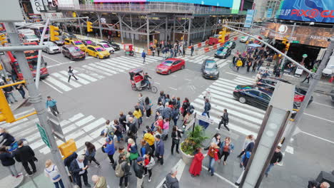 Times-Square-In-New-York-Many-Tourists-Admire-The-Bright-Lights-Of-Advertising-In-The-Heart-Of-The-U