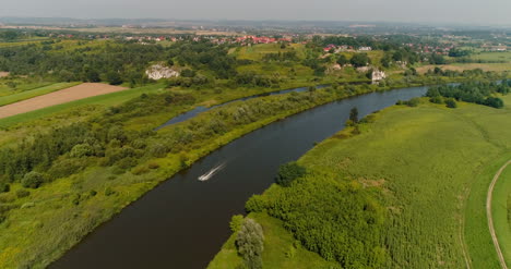 Aerial-View-Of-Motorboat-Swimming-In-River