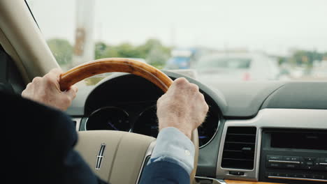 Businessman-Driving-Luxury-Lincoln-Sedan