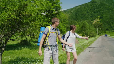 Young-Couple-Hitchhiking-4K-Video