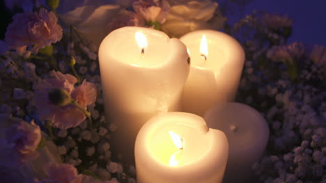 Close-Up-Shot-Of-Lit-Candles-During-Wedding-Reception