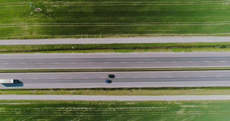Car-Passing-Highway-Aerial-View-5