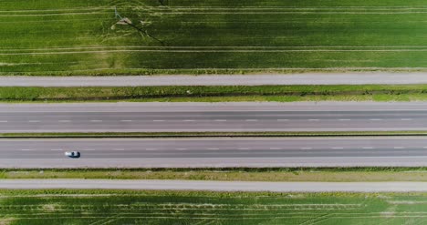Car-Passing-Highway-Aerial-View-6