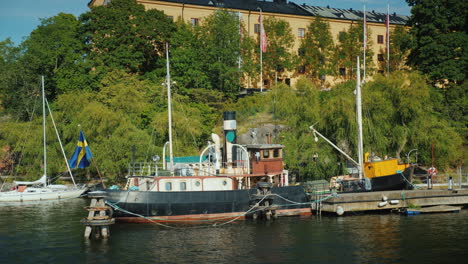 The-Embankment-Of-Stockholm-Beautiful-Yachts-And-Old-Houses-A-Clear-Sunny-Day-In-The-Capital-Of-Swed