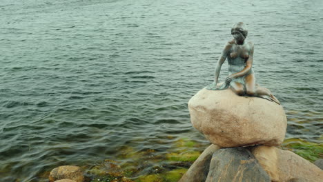 The-Statue-Of-The-Little-Mermaid-Becomes-Wet-Under-The-Rains-In-The-Bay-Of-Copenhagen