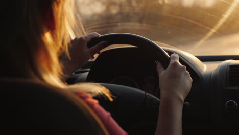 Silhouette-Of-A-Female-Driver-Driving-A-Car