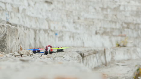 Racing-Drone-Takes-Off-From-Concrete-Steps
