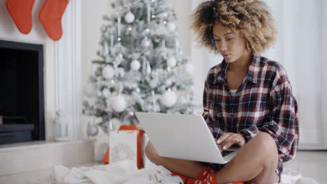 Young-woman-relaxing-at-Christmas-time