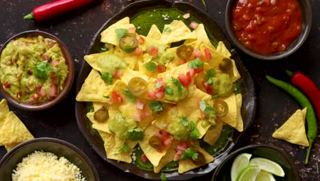 Tasty-mexican-nachos-chips-served-on-ceramic-plate