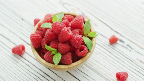 Bowl-with-raspberries-and-leaves