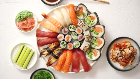 Various-sushi-rolls-placed-on-round-ceramic-plate