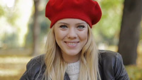 Happy-looking-woman-in-red-beret