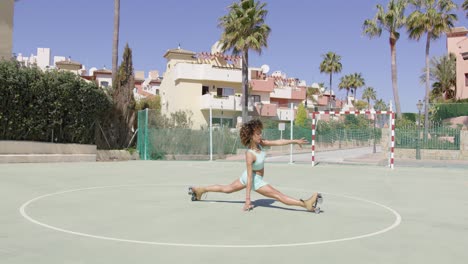 Fit-woman-in-roller-skates-stretching
