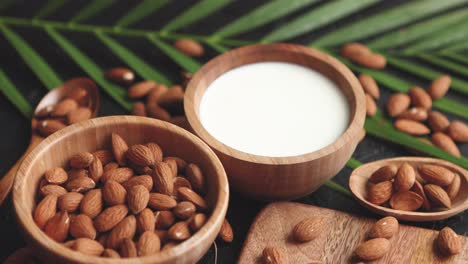 Close-up-of-Almonds-in-wooden-bowl-and-almond-milk