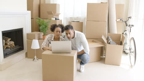 Young-black-couple-moving-into-their-new-home