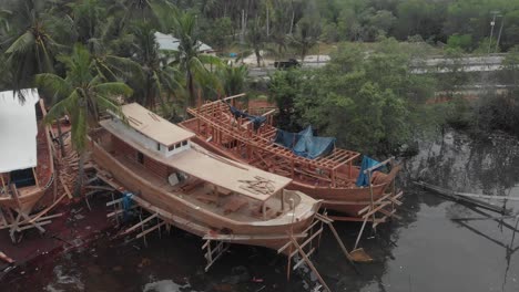 boat construction at belitung island indonesia, drone view