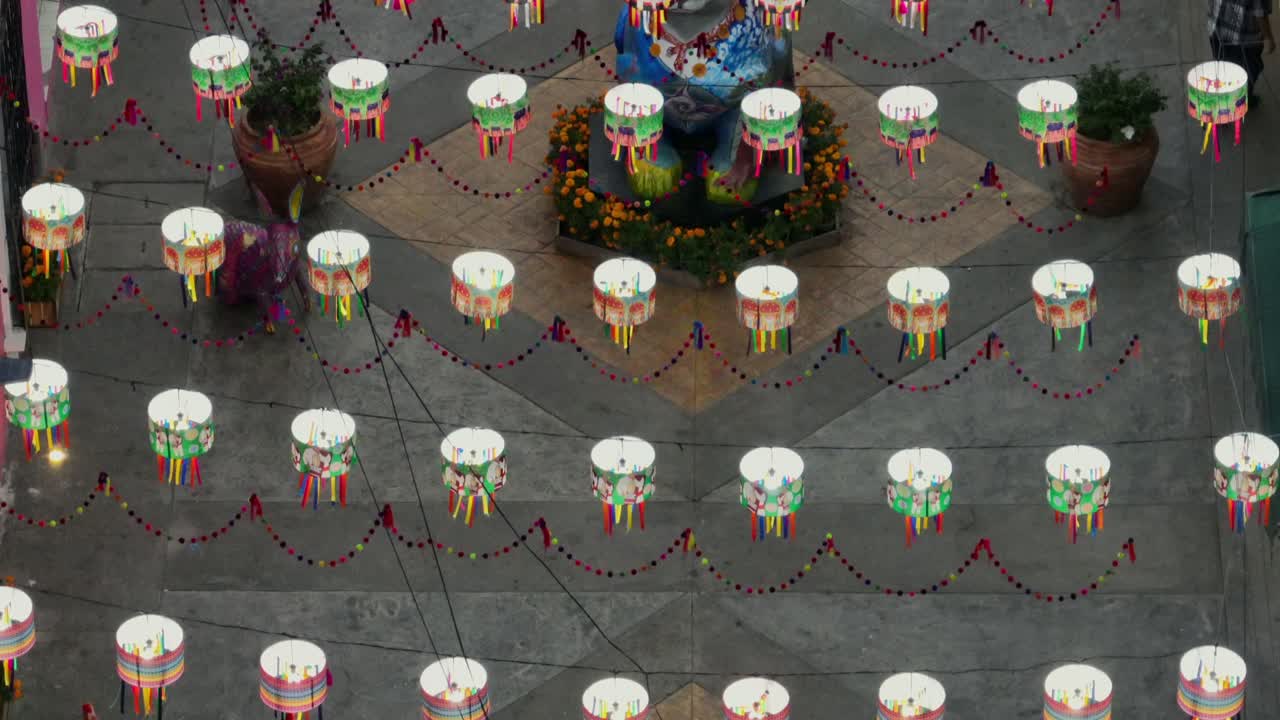 Zoomed in shot of pedestrian street in Tuxpan with El Conejo Statue