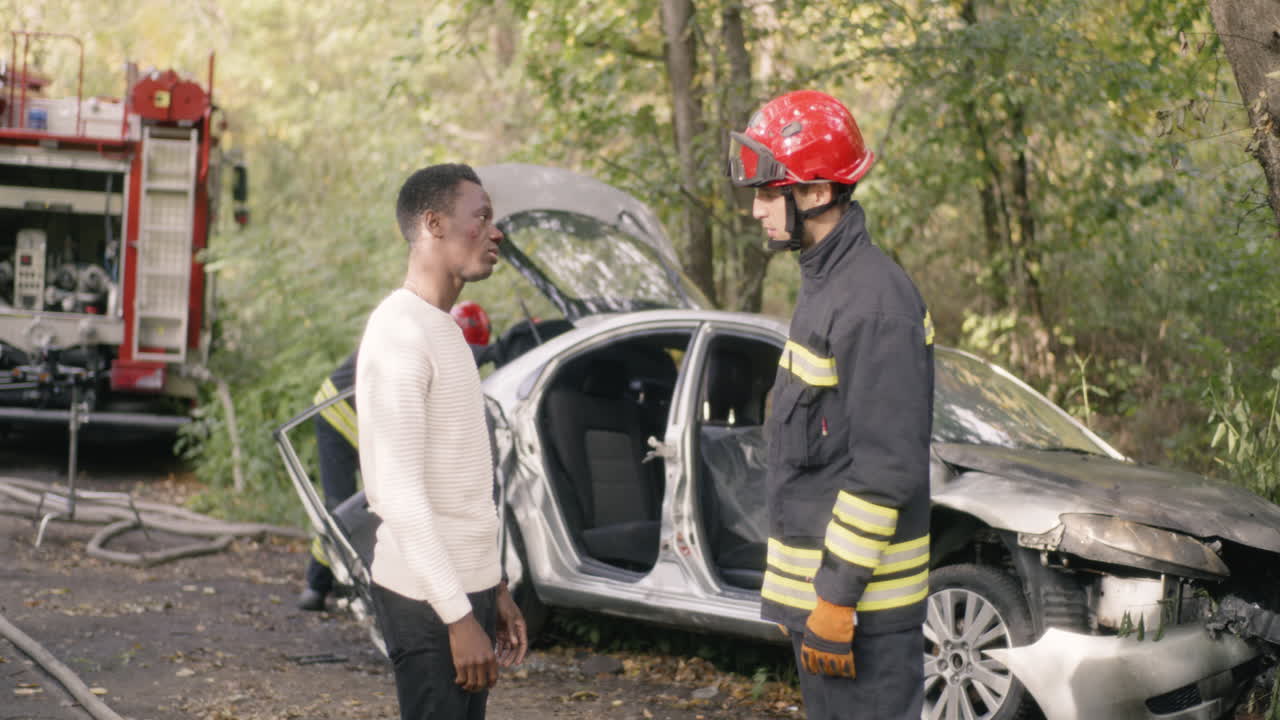 Injured Man at Car Accident Scene
