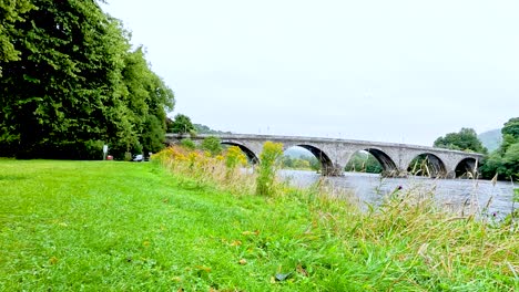 a serene view of a historic stone bridge