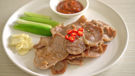 grilled pork neck sliced on plate in asian style