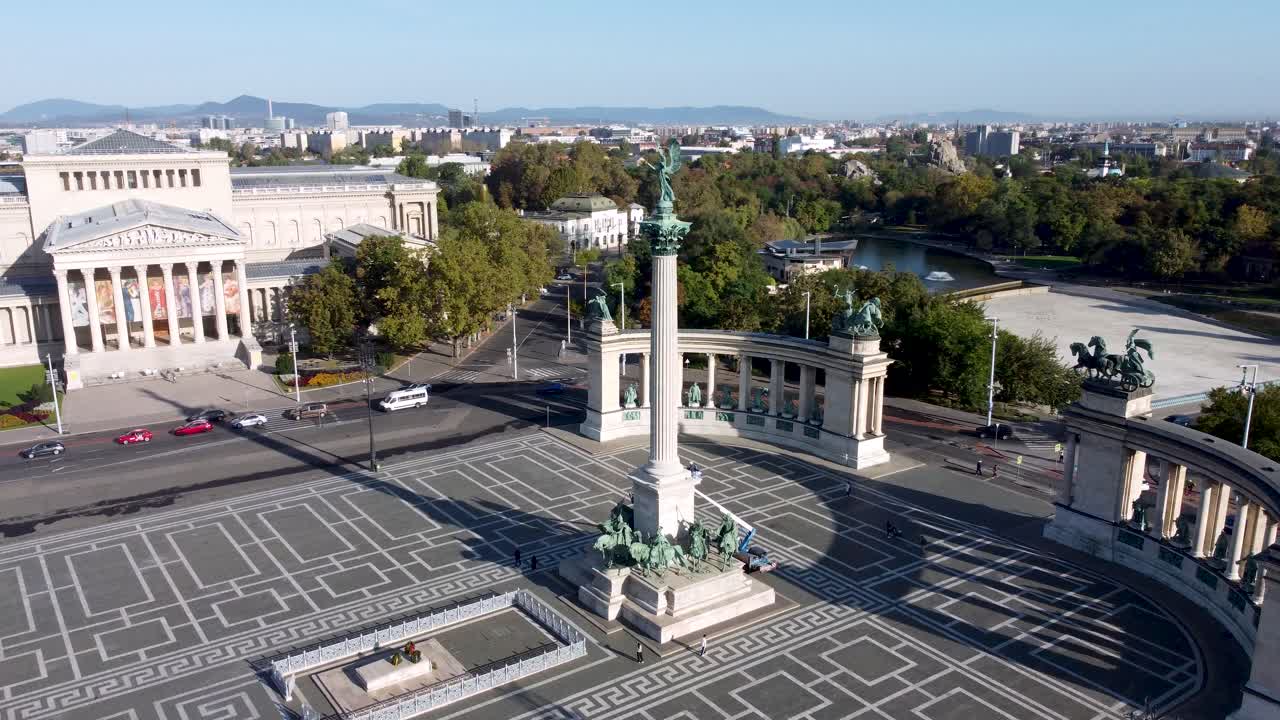 Arcing aerial reveals Heroes' Square with Millennium Monument, Budapest, Hungary