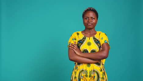 portrait of sweet woman feeling confident in traditional native pattern attire