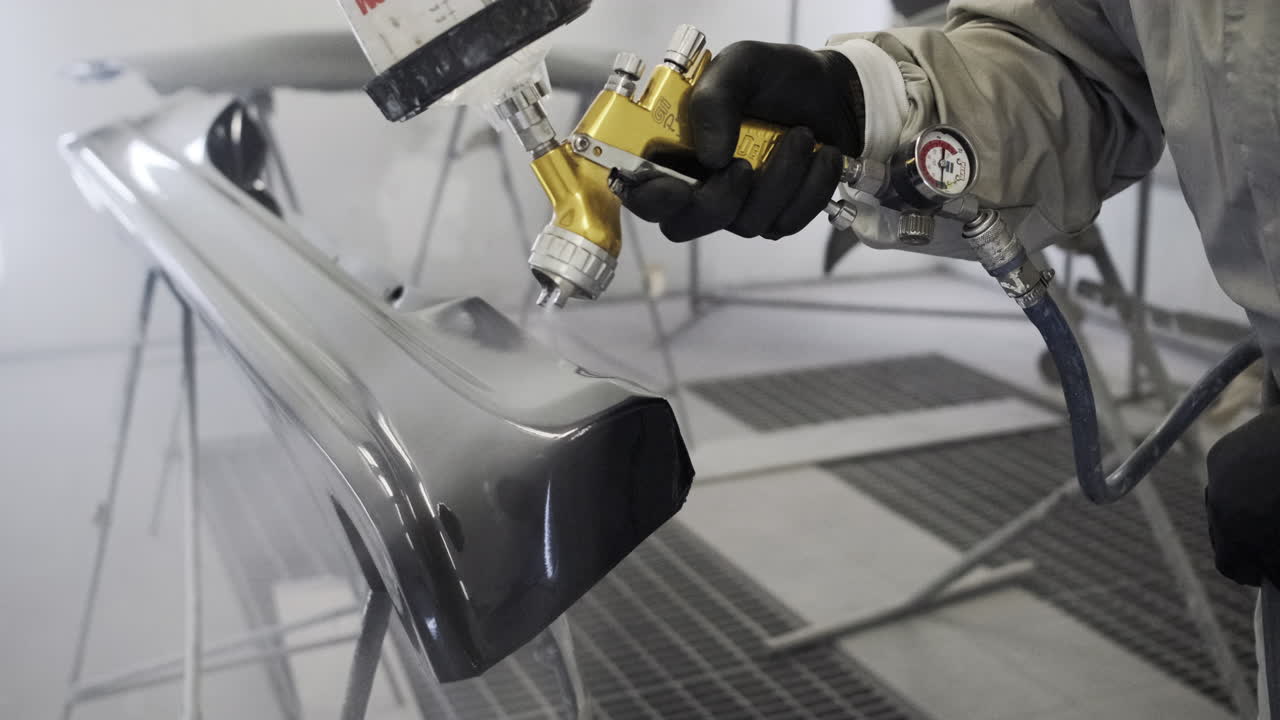 Car Body Panel Painting in a Paint Booth