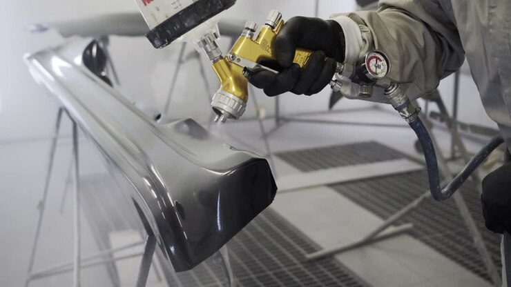 Car Body Panel Painting in a Paint Booth