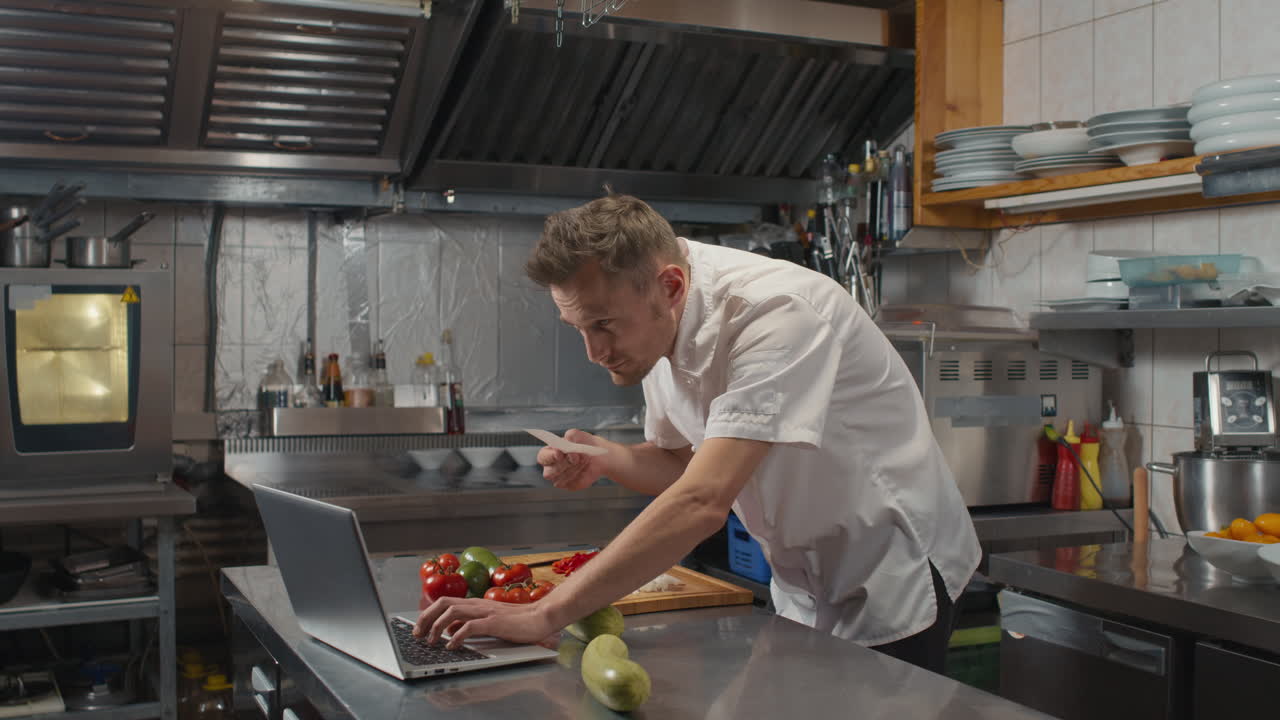 Chef Cooking At Commercial Kitchen