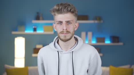 portrait of blond and blue-eyed young man.