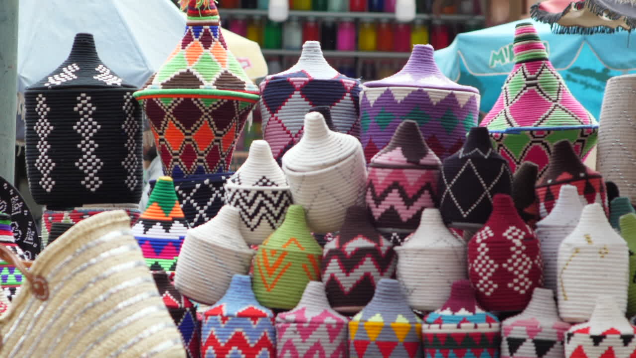 Close up of colourful decorative objects as bins in an Arabian street stall