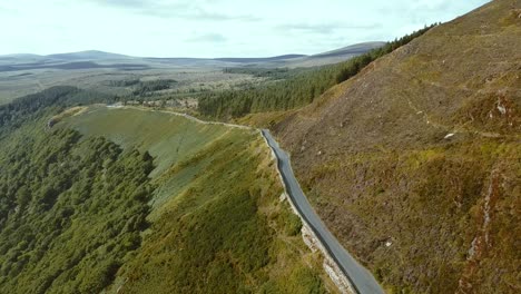 tiny irish road in a sunset time, wicklow, ireland