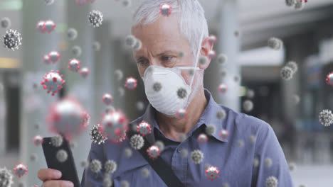 Animation-of-virus-cells-over-senior-caucasian-man-wearing-face-mask