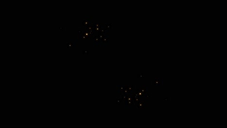 brillos dorados sobre un fondo negro