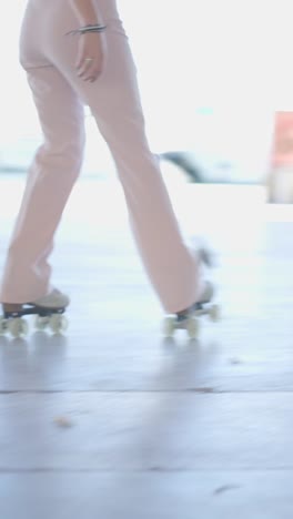 person roller skating on a concrete floor
