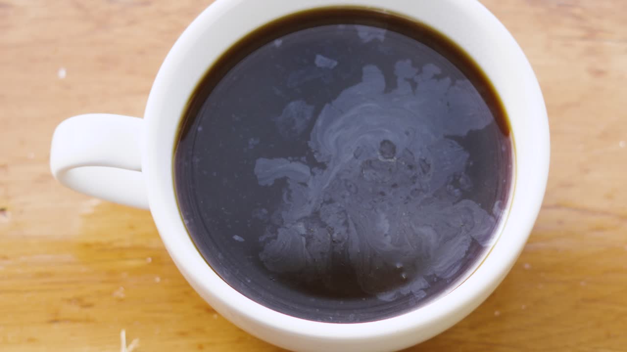 Top View of Fresh Morning Black Coffee in Small China Mug Ready to Drink for Caffeine Beverage