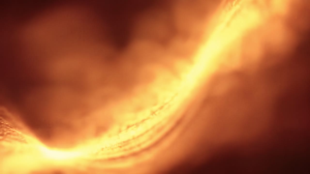 Experience the mesmerizing flow of molten lava as it glistens under sunlight, showcasing the beauty of a volcanic landscape during an active eruption. Witness nature's raw power and beauty.