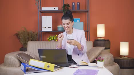 home office worker young woman doing online shopping.