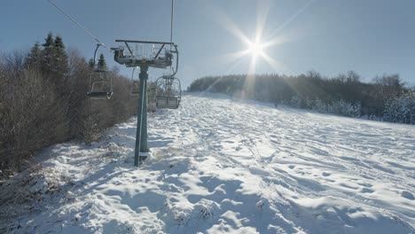 slow motion pov view ski lifts sunny winter snow day ski resort