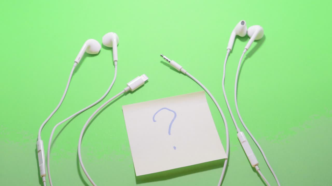 headphones mini jack versus lightning connector adapter isolated chromakey